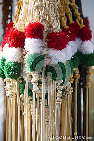 Red white and green colored whips at the farmers market for sale Stock Photo