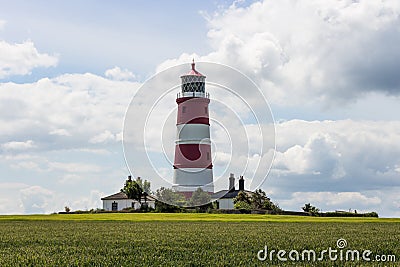 Red and white lighthouse at Happisburgh Editorial Stock Photo