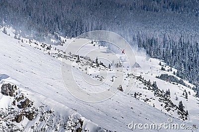 Red and White mountain rescue helicopter providing emergency service Stock Photo