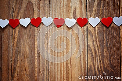 Red and White Ppaper hearts on the clothesline On Stock Photo