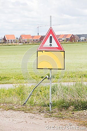 Red and white road traffic warning sign Stock Photo