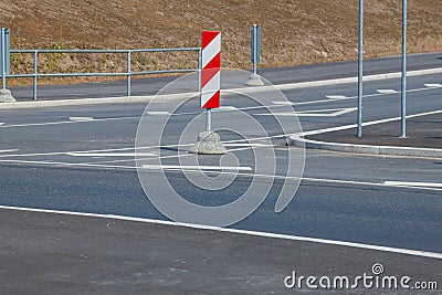 Red and white striped road signs Stock Photo