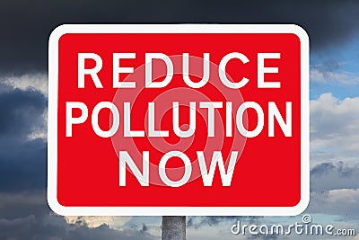 Warning sign REDUCE POLLUTION NOW Stock Photo