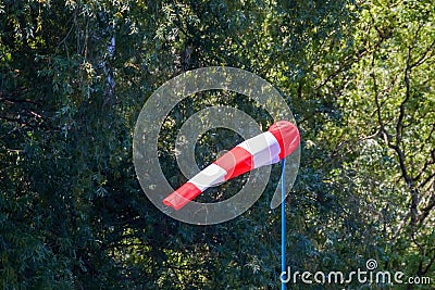 Red and White Windsock indicator of wind Stock Photo