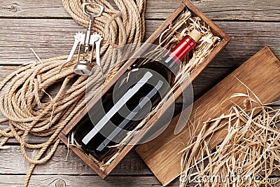 Red wine bottle in box Stock Photo