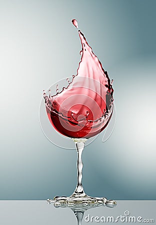 Red wine glass on gray background Stock Photo