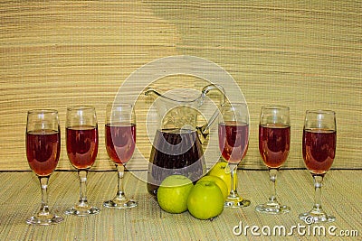 Red wine in glasses and bottle natural grass mate background Stock Photo