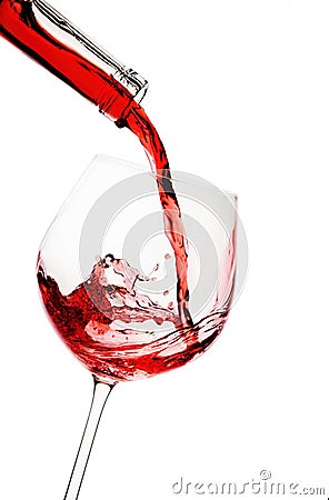 Red wine poured in a glass Stock Photo