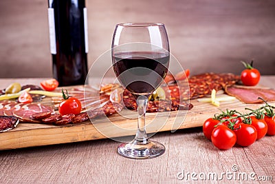 Red wine and smoked meat delicatessen Stock Photo