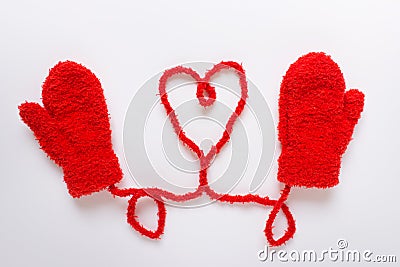 Red winter mittens with heart shape Stock Photo