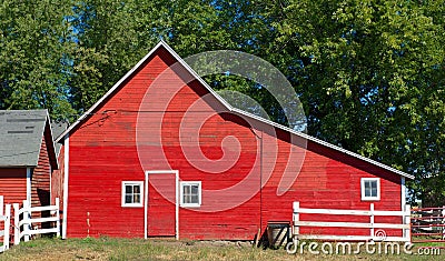 Red Wisconsin Barn With Door and Three Windows Stock Photo