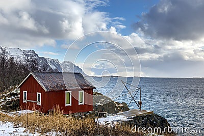 Red wooden house called rorbu at the Lofoten archipelago Stock Photo