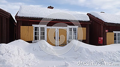 Swedish wooden red church house in Lovanger kyrkstad in winter in Sweden Stock Photo