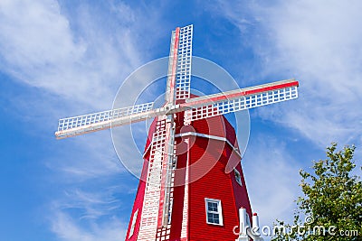 Red wooden windmill Stock Photo