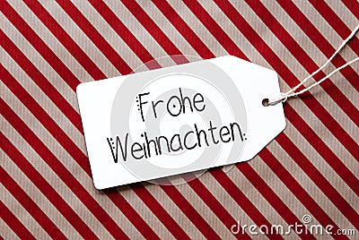 Red Wrapping Paper, Label, Frohe Weihnachten Mean Merry Christmas Stock Photo