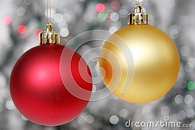 Red and Yellow Christmas ball against background of christmas li Stock Photo