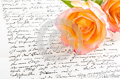Red yellow rose over a hand written letter Stock Photo
