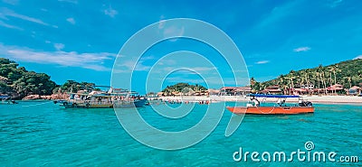 Boats, turquoise water and white sand beach, Redang Island, Malaysia Stock Photo
