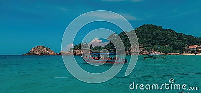 Boats, turquoise water and white sand beach, Redang Island, Malaysia Editorial Stock Photo