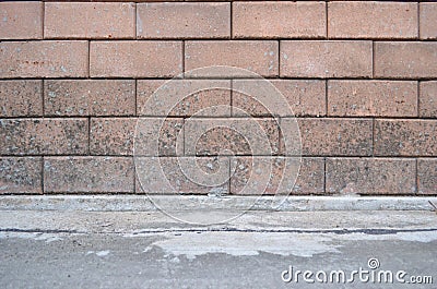 Redbrick wall with cement floor texture for background. Stock Photo