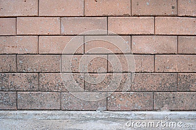 Redbrick wall with cement floor texture for background. Stock Photo