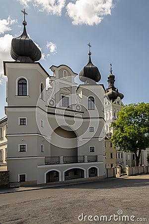 The buildings of the monastery illuminated by the spring sunshine. Stock Photo