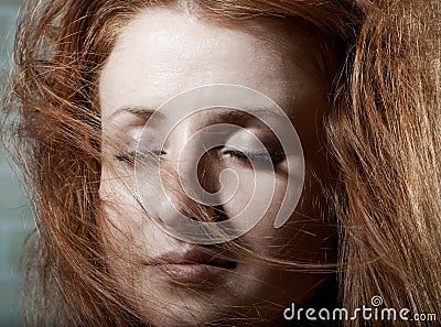 Redhaired mysterious woman Stock Photo