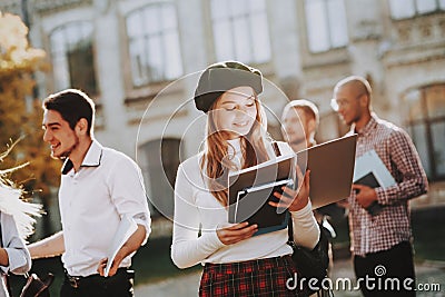 Redhead. Courtyard. Books. Coffee. Good Mood Stock Photo