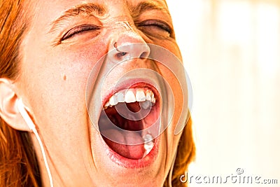 Redhead Girl With Mouth Wide Open Stock Photo