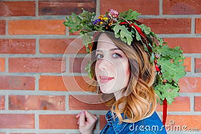 Redhead girl with oak leaves wreath at Germany Unity day Stock Photo