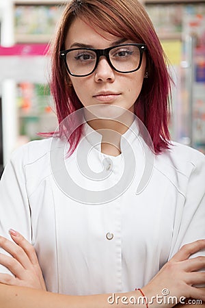 Redhead pharmacist with eyeglasess Stock Photo