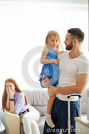 Redhead woman is cryng after quarrel with husband Stock Photo