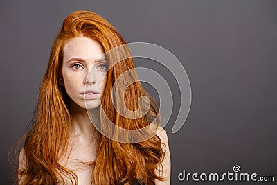 Redhead woman,eyelashes, perfect skin. girl,shiny wavy hair Stock Photo