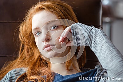 Redhead woman looking at camera Stock Photo