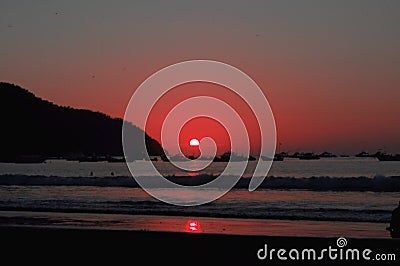 Redish Sunset in Puerto Lopez Stock Photo