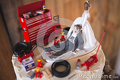 Redneck wedding cake topper with mechanic groom Editorial Stock Photo