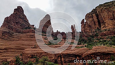 Redo rocks on the road in Sedona on a cloudy day Stock Photo