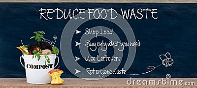 Reduce food waste text, ways to reduced food waste listed on chalk board with compost bin Stock Photo