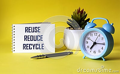 Reduce, reuse, recycle, repeat - environmental conservation and sustainable development concept - handwriting on notepad with Stock Photo