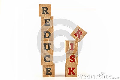 Reduce Risk word written on cube shape. Stock Photo