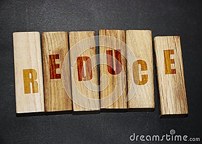 Reduce word letters on wooden blocks,. Resource conservation Reduce, reuse and recycle 3R concept Stock Photo