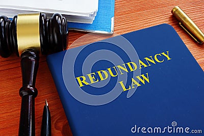 Redundancy law book with gavel Stock Photo