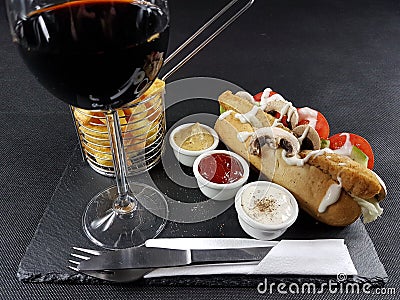 Redwine food frenchfries chicken sauces cutlery plate drink tasty Stock Photo