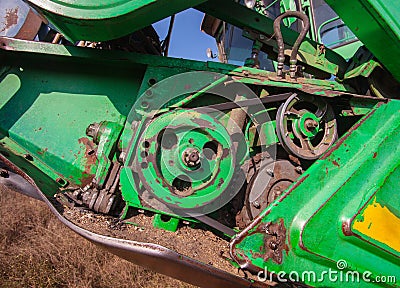 Reel in the combine closeup. Part of the agricultural machine. Stock Photo