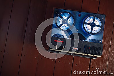 Reel to reel audio tape recorder with blue led light strip Stock Photo