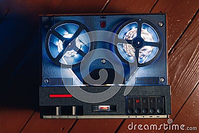 reel to reel audio tape recorder with blue led light strip Stock Photo
