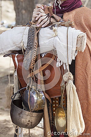 Reenactor roman soldier holds marching pack Stock Photo