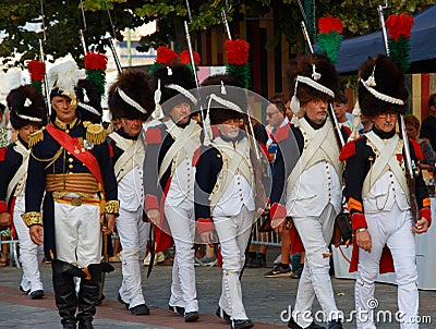 The reenactors dressed as Napoleonic soldiers for celebration the Napoleon birthday who was born in Ajaccio. Corsica Editorial Stock Photo