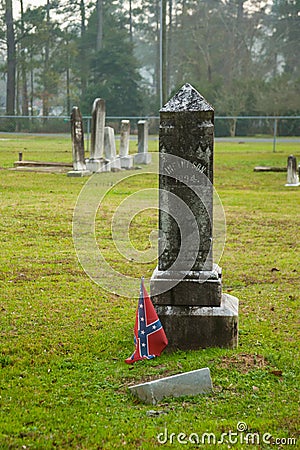 Confederate Flag at a Gravestone Editorial Stock Photo