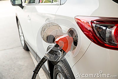 Refill and filling Oil Gas Fuel at station.Gas station - refueling.To fill the machine with fuel Stock Photo